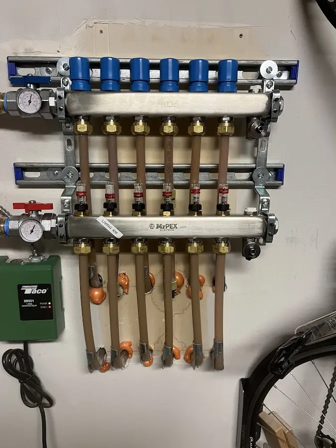 Plumber performing Water Heater Repair at a residential property in Wareham